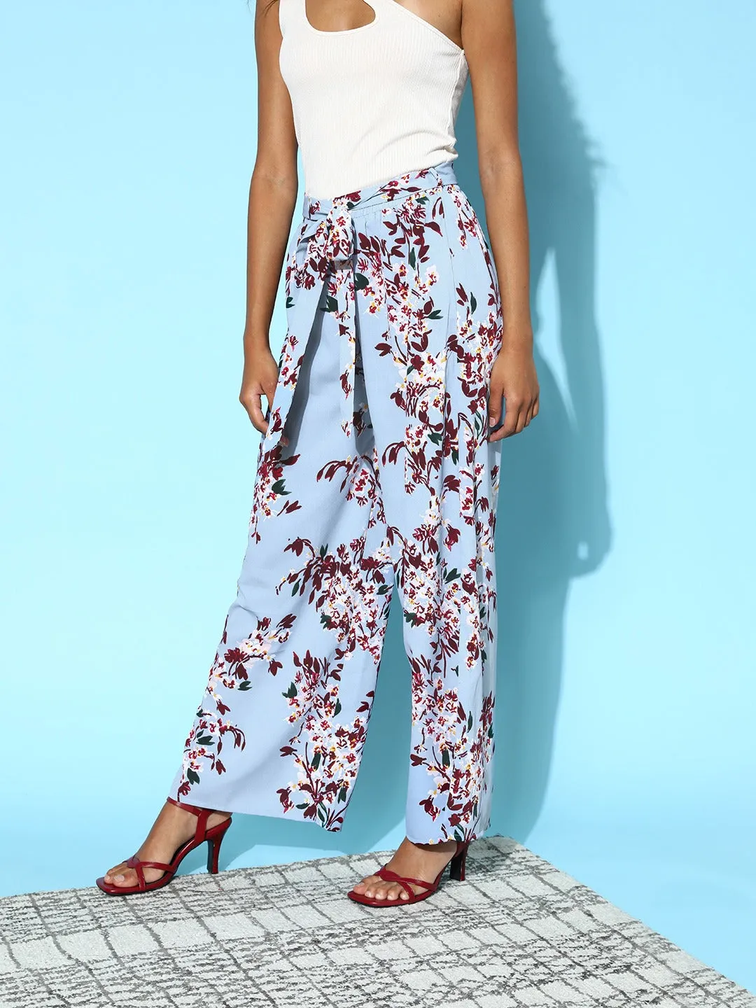 Berrylush Women Blue & Maroon Floral Printed Tie-Up High-Rise Waist Flared Parallel Trousers