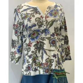 Blue Floral repurposed top into a new tunic size Large. The neckline has snaps to hold in place. The fabric on the bottom is new polyester.