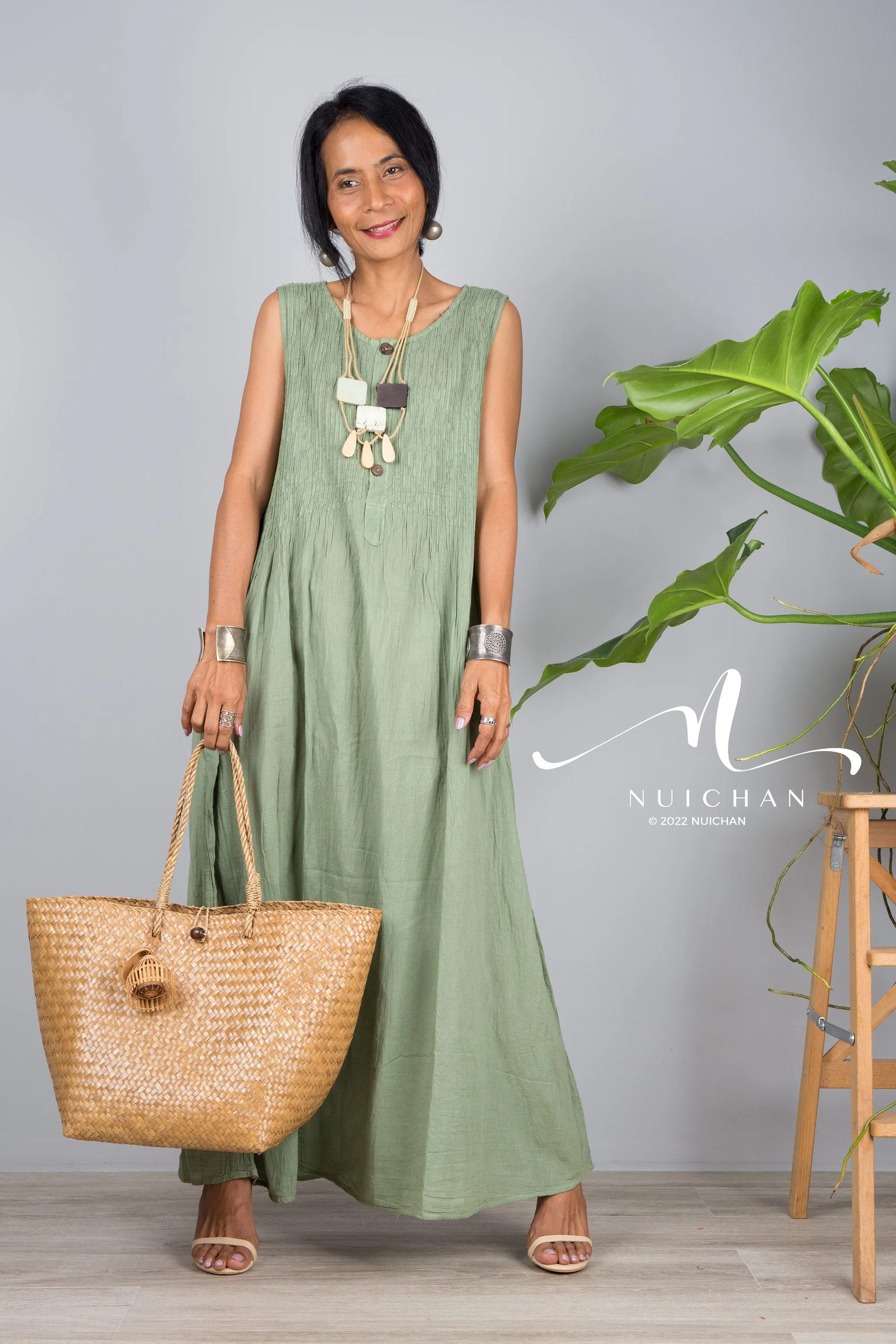 Sleeveless green cotton dress