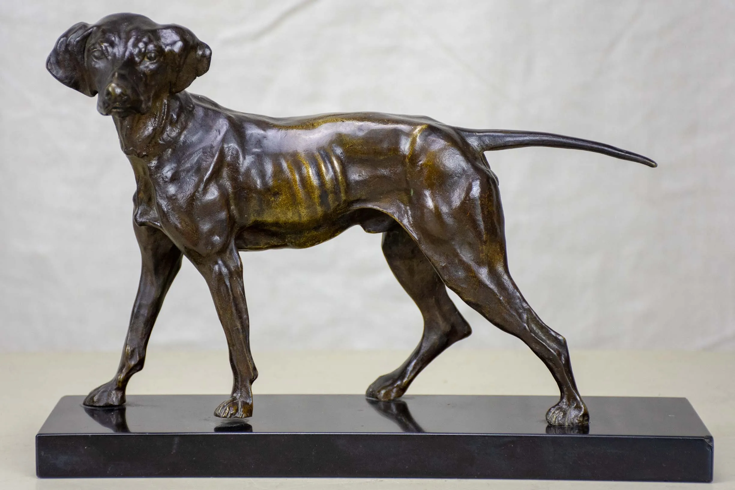 Vintage bronze sculpture of a hunting dog